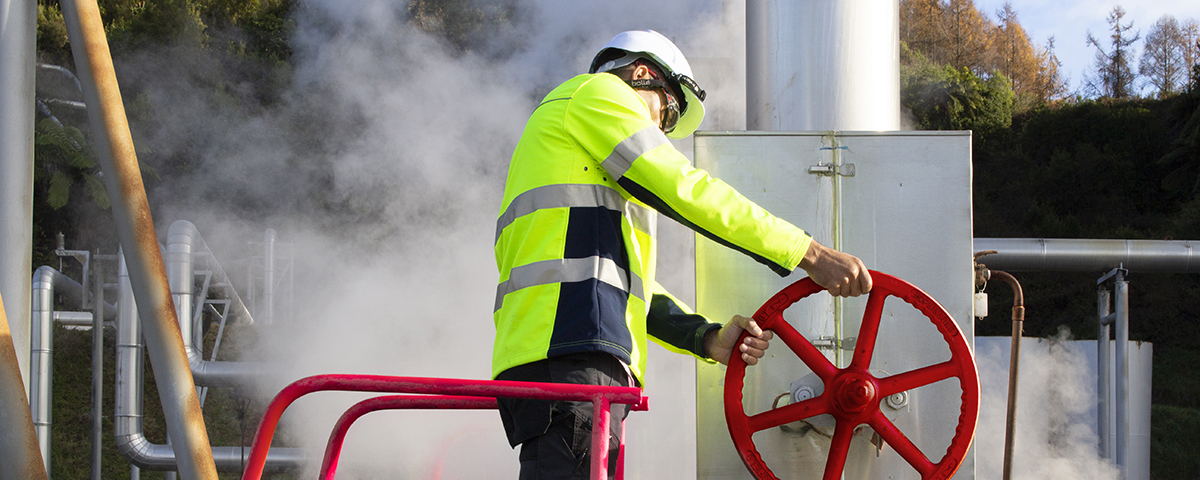 man turning a valve | CB | 1200x480 man turning a valve | CB | 1200x480